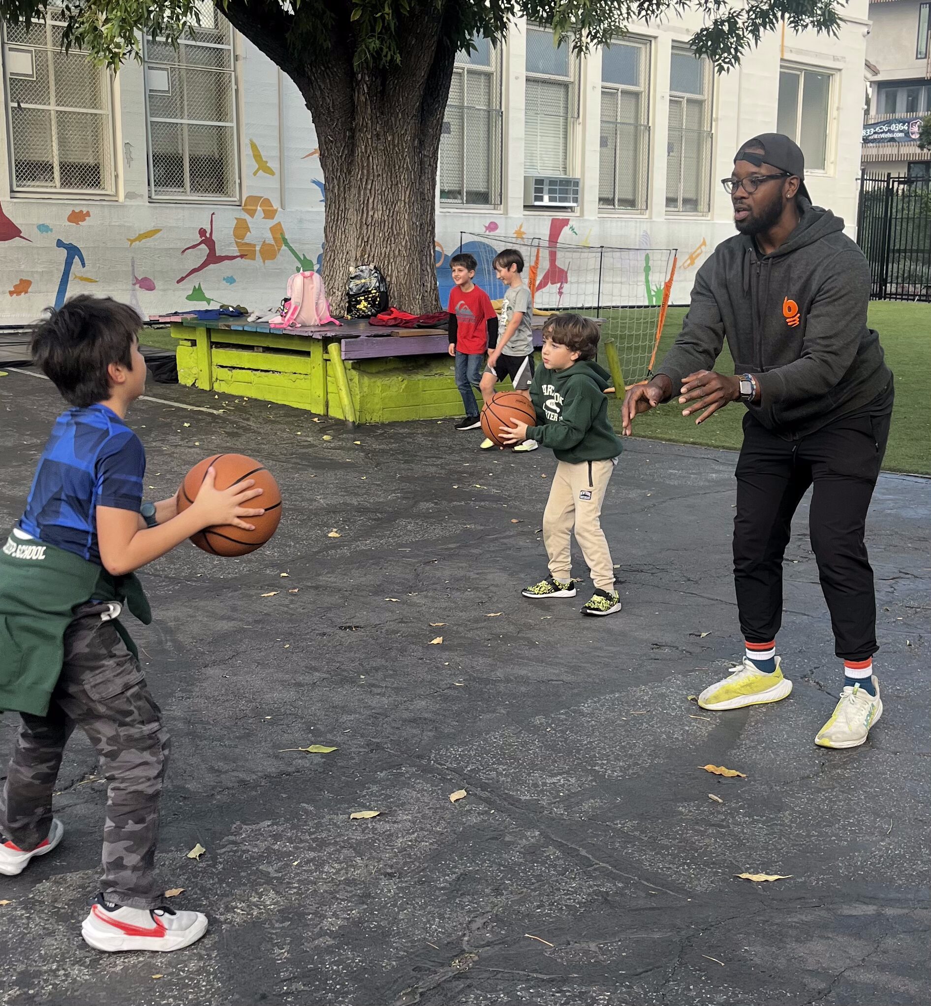 Bounce after-school activity with coach and students